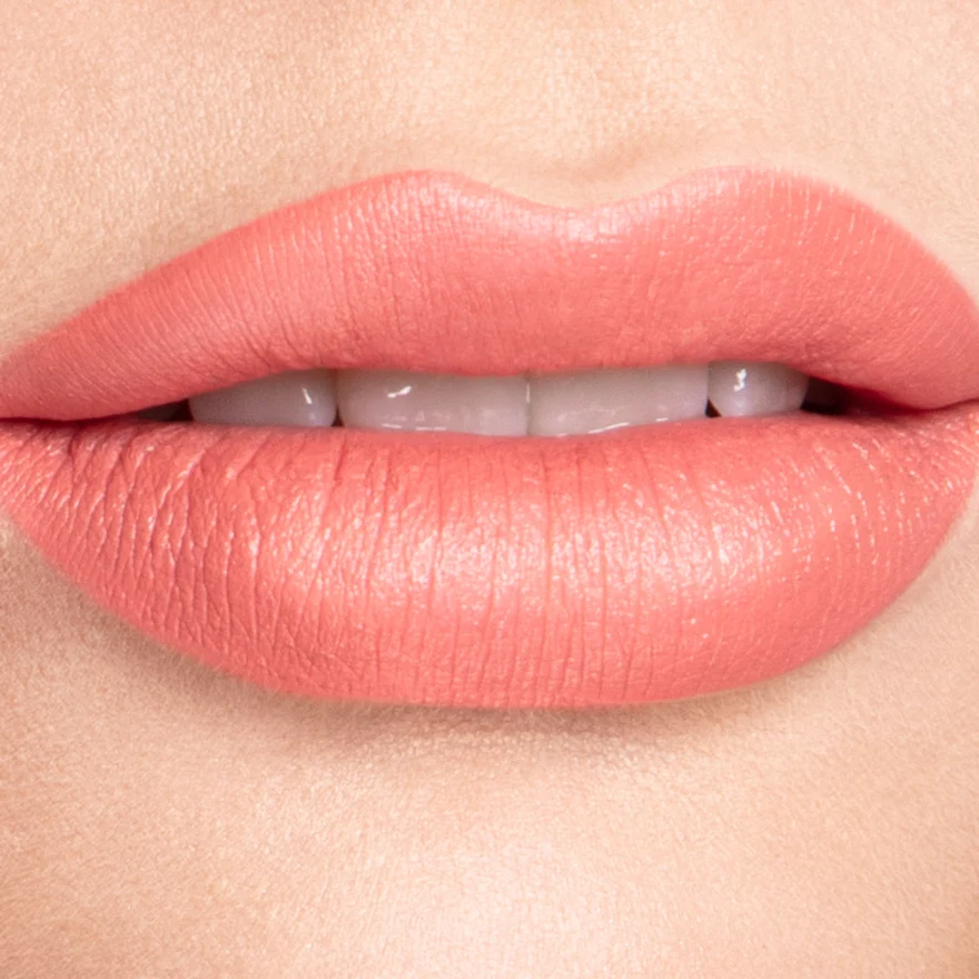 Macro shot of coral lipstick on natural lips, Philip Martin's make-up, campaign photographed by Ina Cenusa