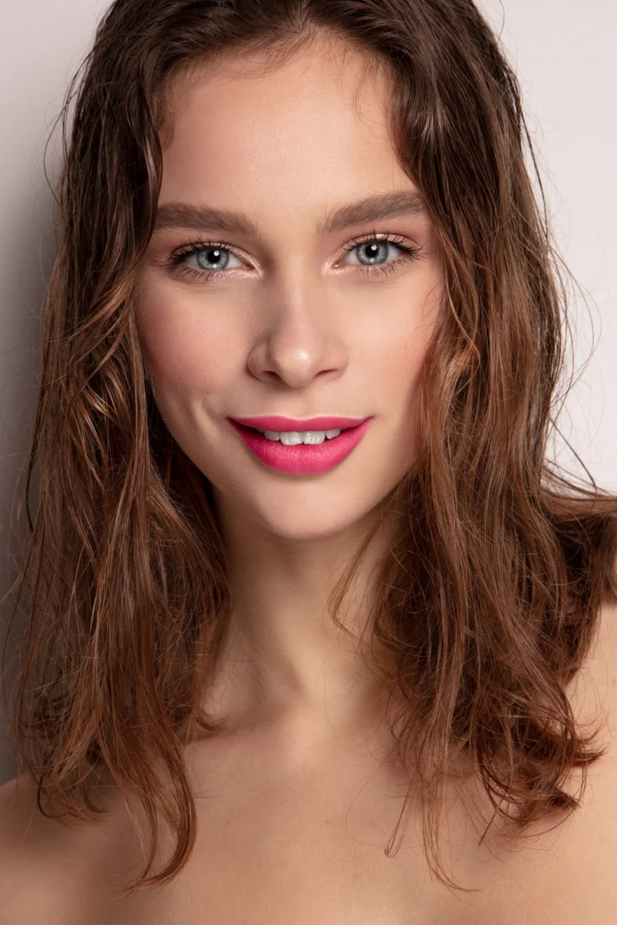 Beauty portrait with bright pink lipstick and glowing skin, Philip Martin's campaign photographed by Ina Cenusa