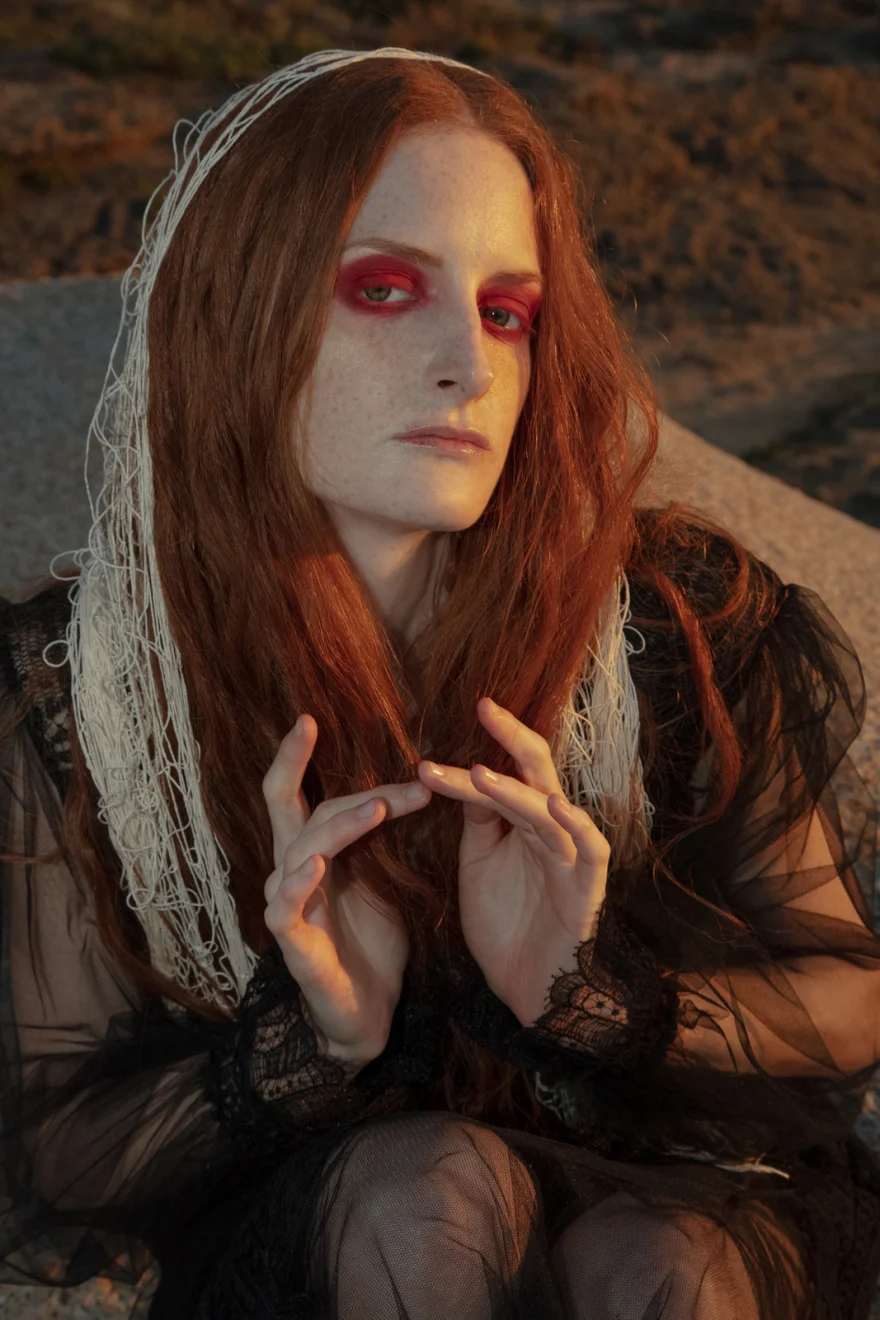 Portrait with graphic red eye make-up and a lace veil in warm sunset light, SHOT Magazine editorial photographed by Ina Cenusa