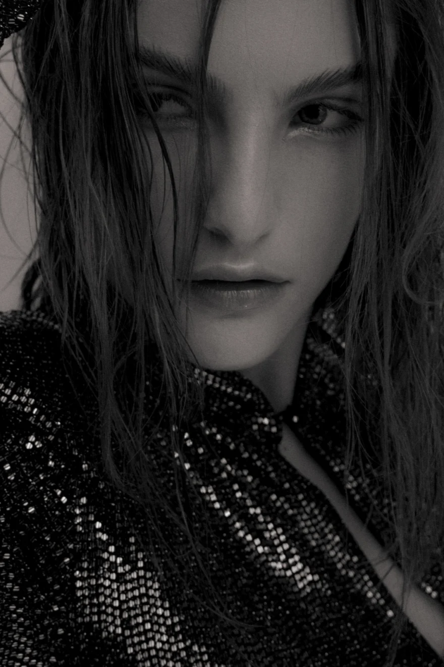 Moody black and white portrait in a sequinned high-neck top, Iso Model Management editorial photographed by Ina Cenusa