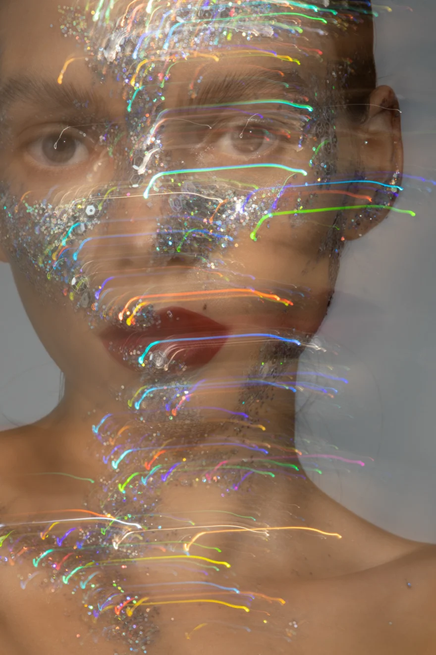 Experimental light-painting portrait with coloured light trails over glitter make-up, Iso Model Management editorial photographed by Ina Cenusa