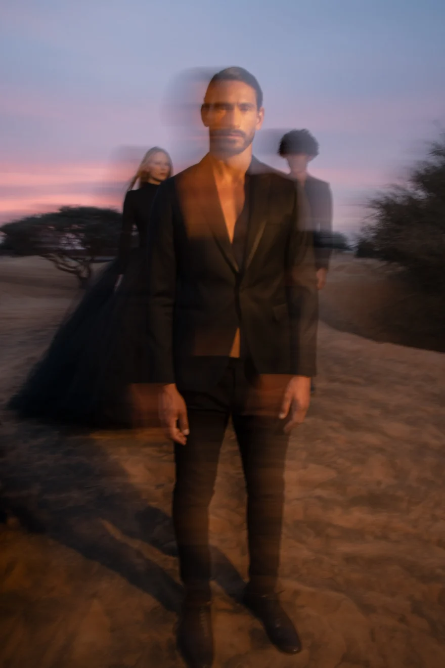 Long-exposure portrait in the desert at dusk, Philip Martin's campaign photographed by Ina Cenusa