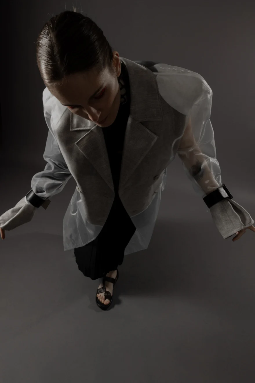 Close shot of a sheer organza jacket with a black cuff detail, Hunter Magazine editorial photographed by Ina Cenusa