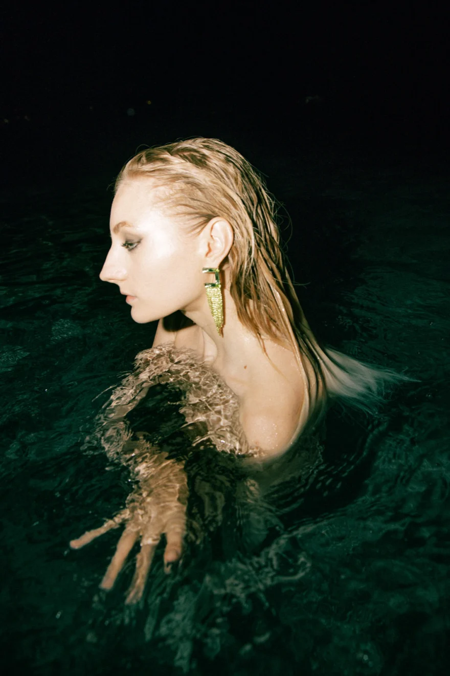 Profile portrait emerging from the water at night, Amalfi Coast personal project photographed by Ina Cenusa