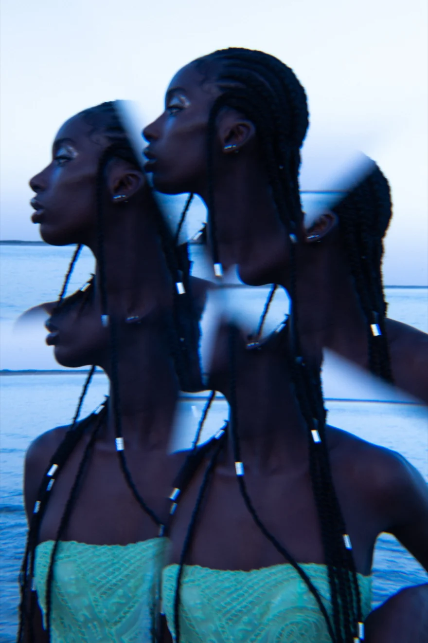 Double-exposure profile portrait against the sea at blue hour, Ermanno Scervino × SHOT Magazine editorial photographed by Ina Cenusa