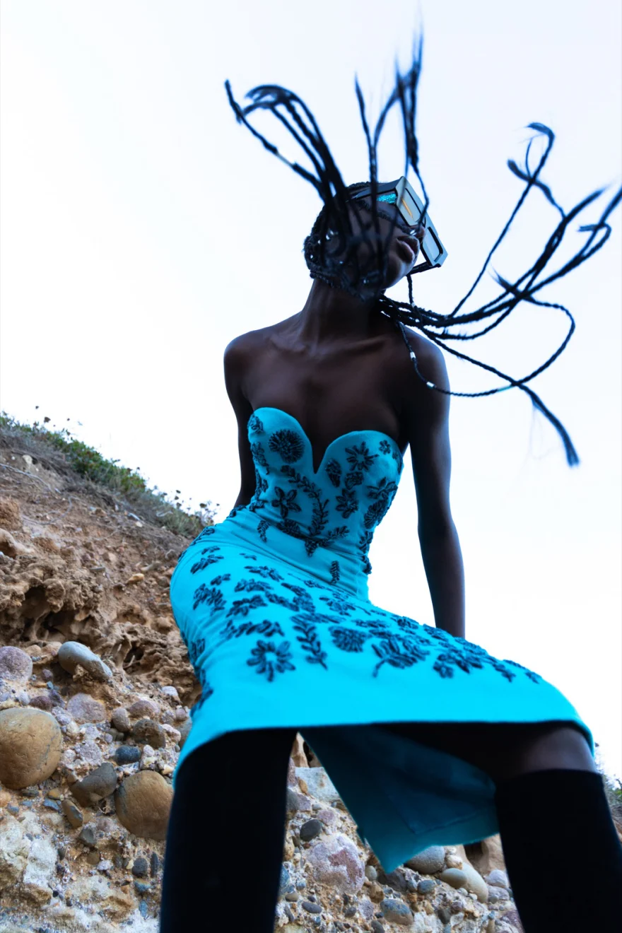 Model Magguate Thiam in an embroidered turquoise Ermanno Scervino dress with braids in motion, Ermanno Scervino × SHOT Magazine editorial photographed by Ina Cenusa