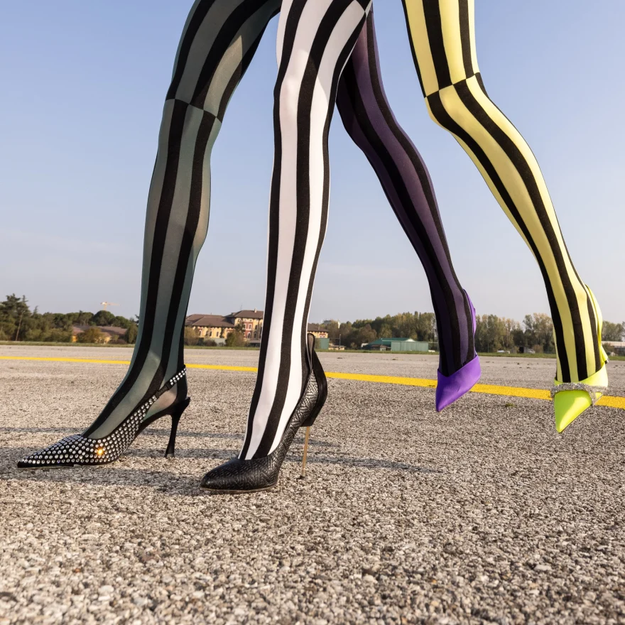 Graphic still life of patterned tights, Trasparenze campaign photographed by Ina Cenusa