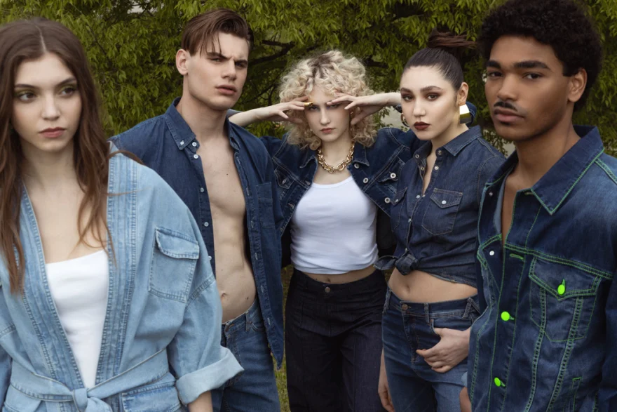 Five models in assorted denim looks standing together outdoors, Carrera Jeans campaign photographed by Ina Cenusa