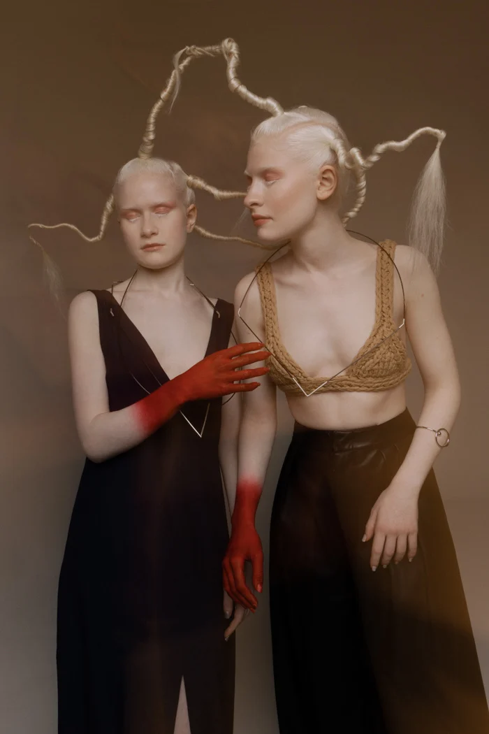 Portrait with sculptural braids and a hand painted deep red, Tangled with Dreams editorial, SHOT Magazine editorial photographed by Ina Cenusa