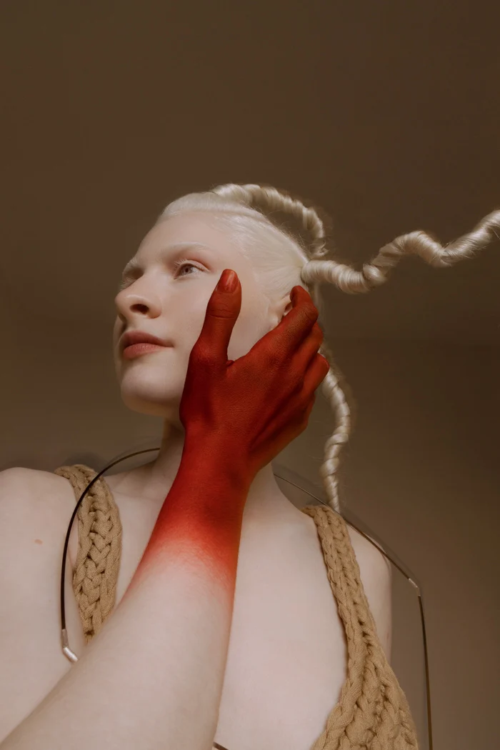 Two models side by side with red-painted hands and braided hair, SHOT Magazine editorial photographed by Ina Cenusa