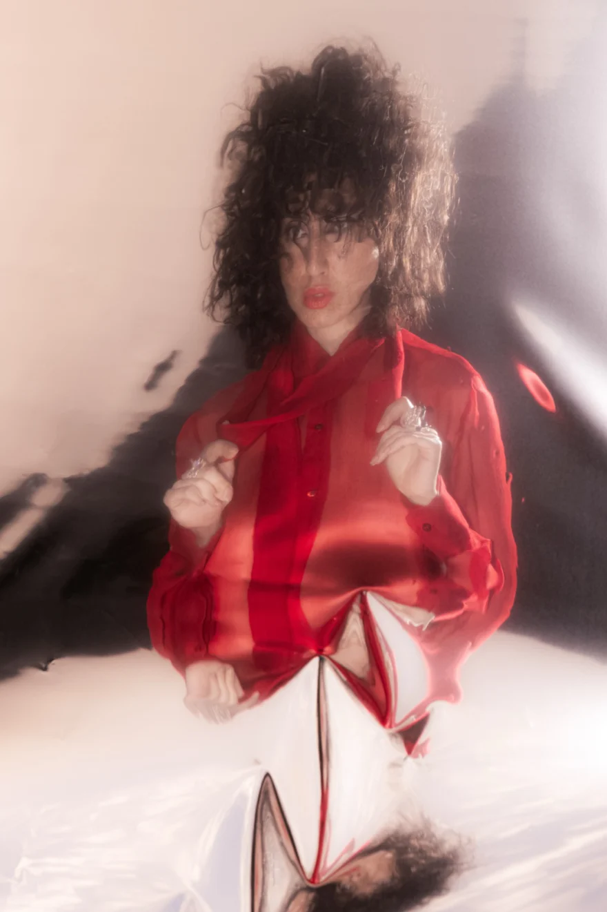 Studio portrait in a sheer red shirt with soft motion blur, SHOT Magazine editorial photographed by Ina Cenusa