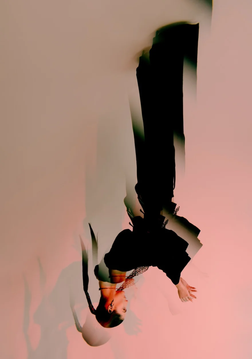 Inverted, dreamlike portrait of a model in a black look, Aetherial Beauty Whispers editorial, SHOT Magazine editorial photographed by Ina Cenusa