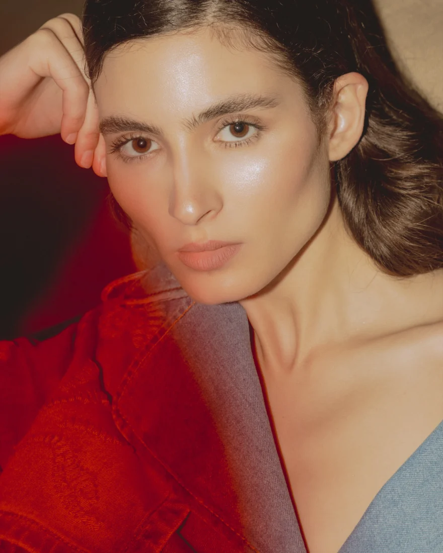 Beauty close-up in warm natural light with a red jacket, SHOT Magazine editorial photographed by Ina Cenusa