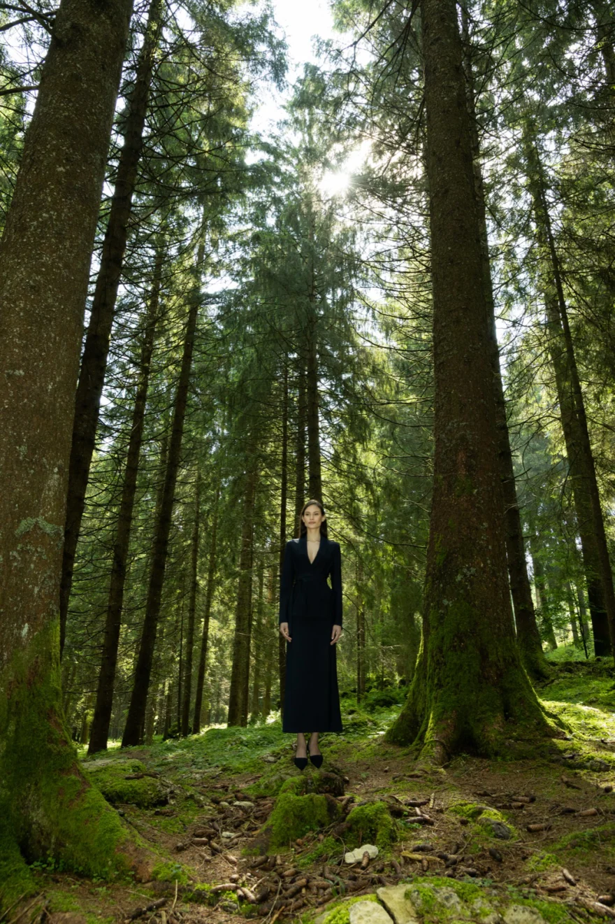 Distant figure among tall forest trees, Camicetta Snob campaign photographed by Ina Cenusa
