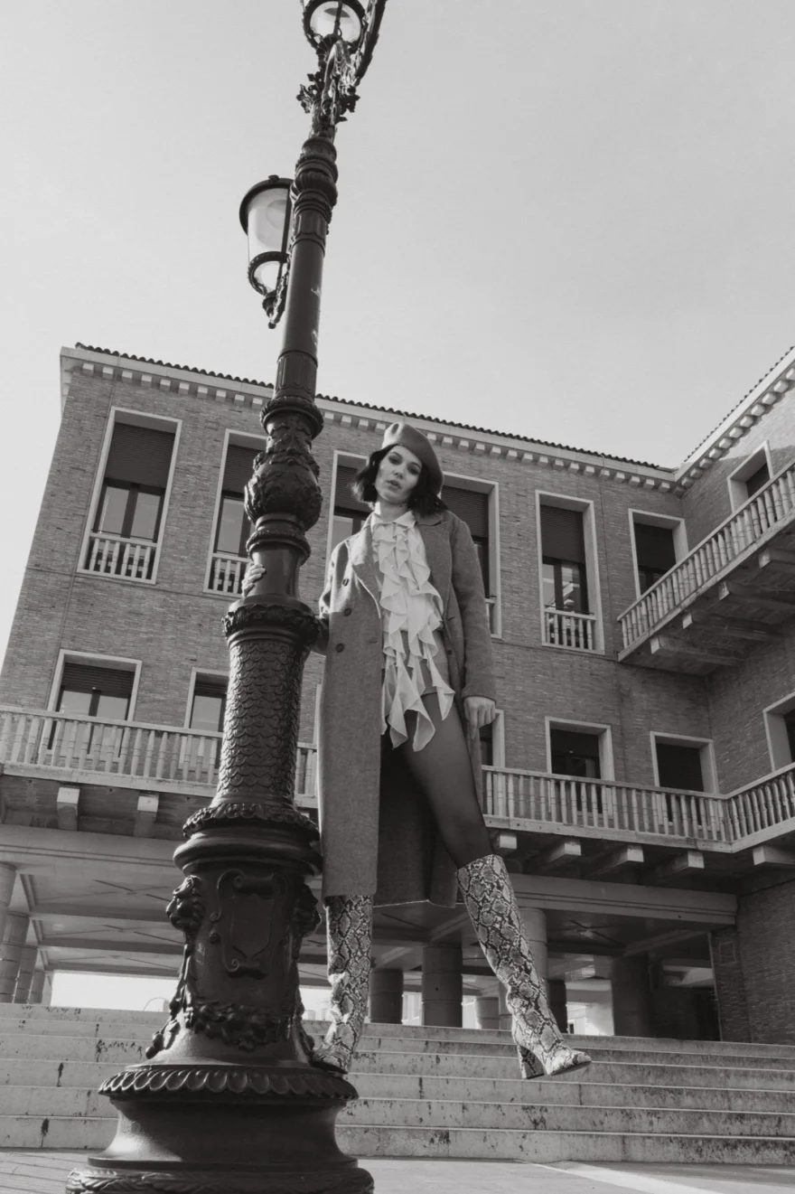 Model beside an ornate Venetian lamppost, Mabrun campaign photographed by Ina Cenusa