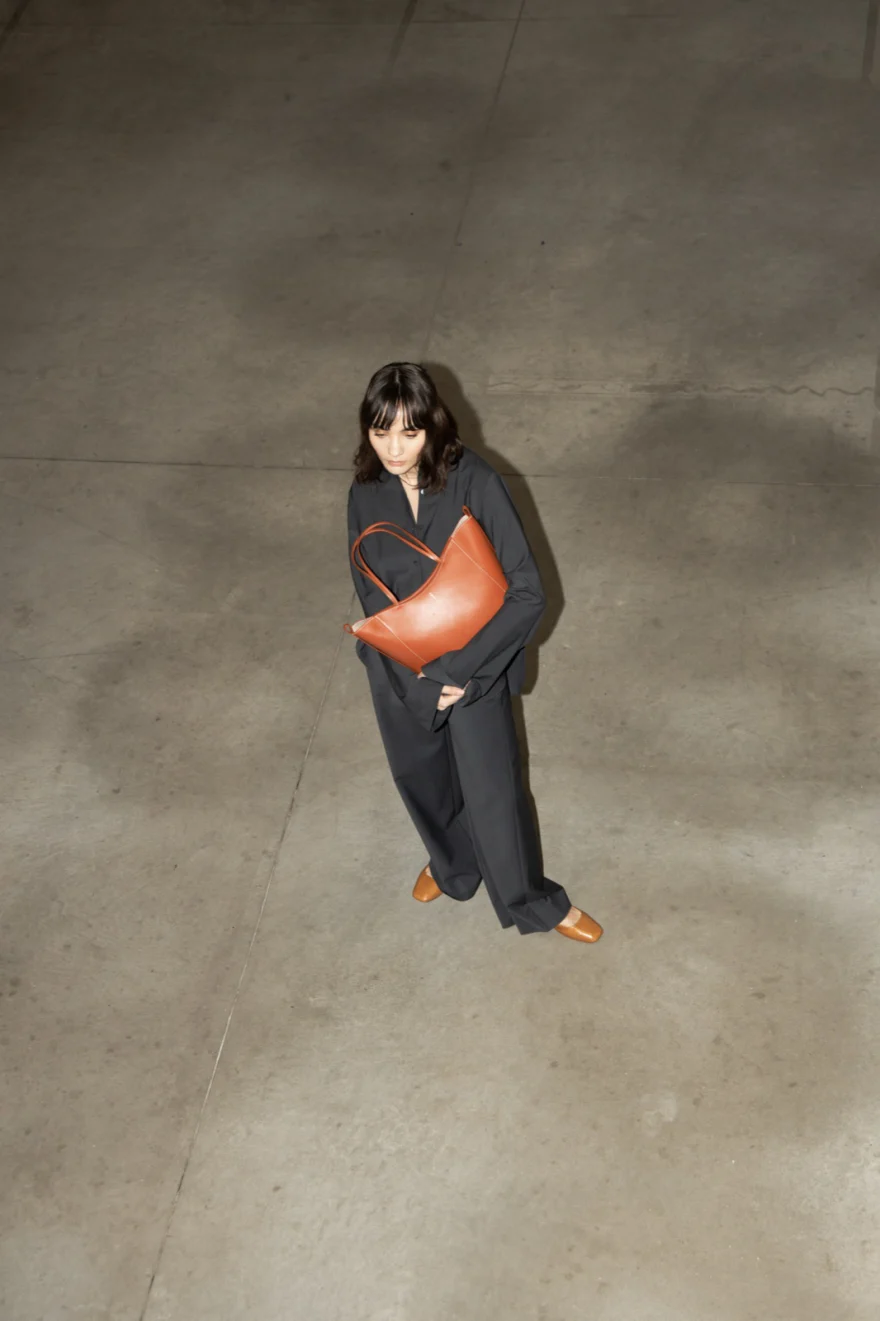 Leather bag detail in studio light, Noesi campaign photographed by Ina Cenusa