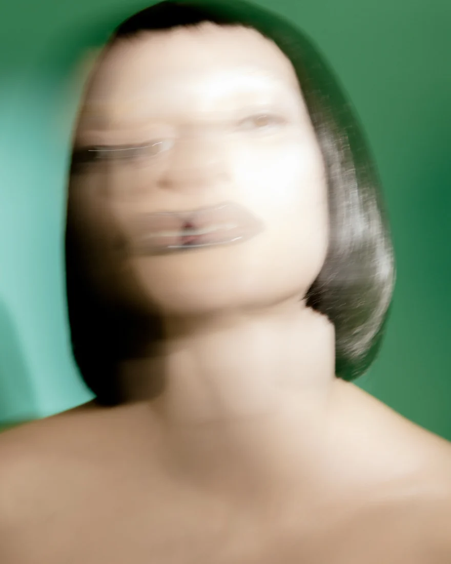 Blurred portrait of the model's face and bob haircut, SHOT Magazine editorial photographed by Ina Cenusa