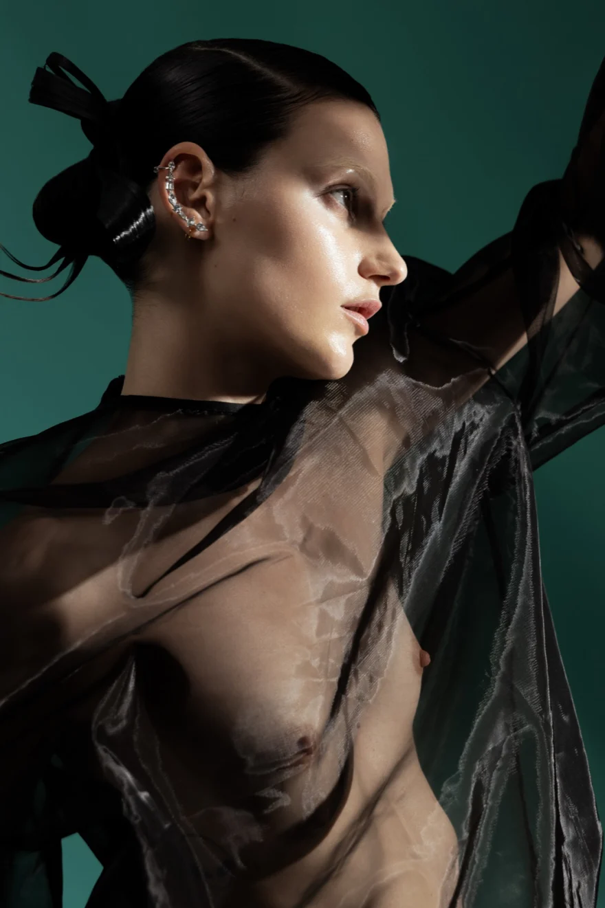 Profile portrait in sheer black organza against a green backdrop, SHOT Magazine editorial photographed by Ina Cenusa