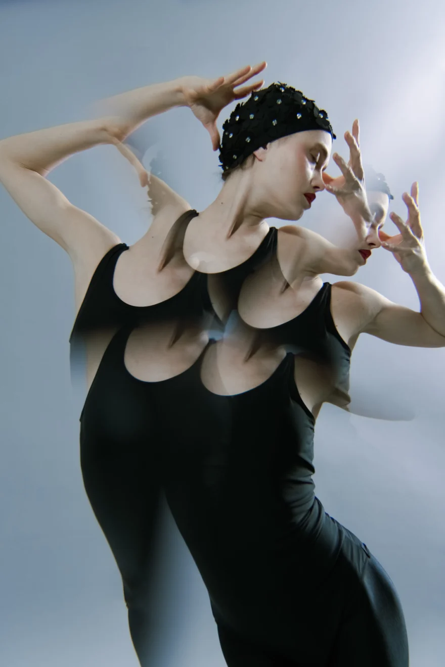 Motion-blurred image of a scalloped black dress and beaded headpiece, SHOT Magazine editorial photographed by Ina Cenusa