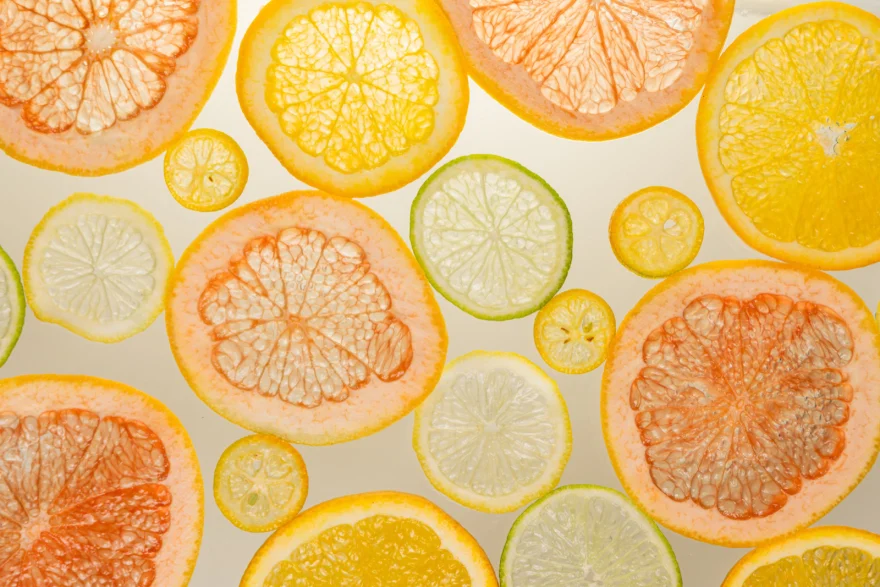 Pattern of translucent citrus slices in yellow and orange, Fuoco Sacro campaign photographed by Ina Cenusa