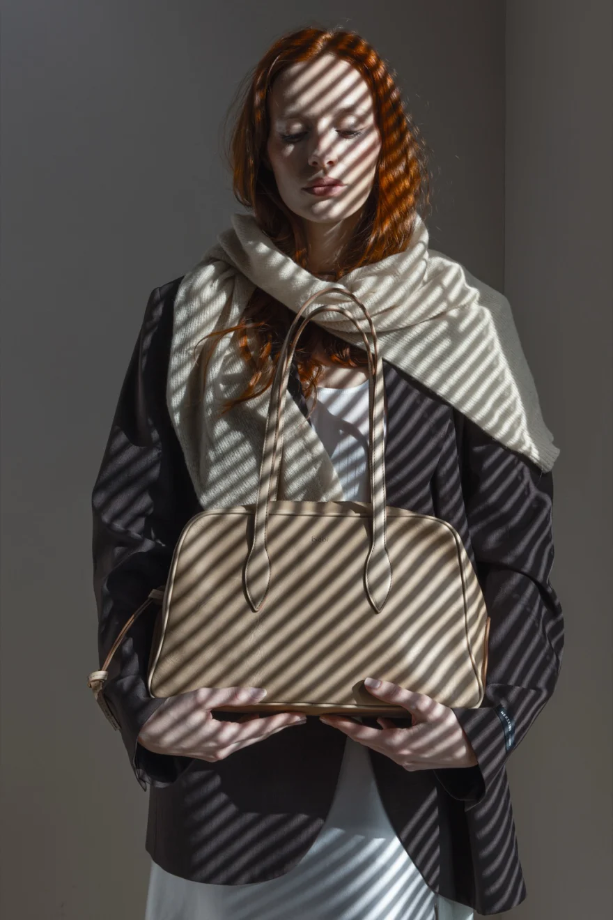 Portrait with a printed scarf wrapped around the head, Biebi campaign photographed by Ina Cenusa