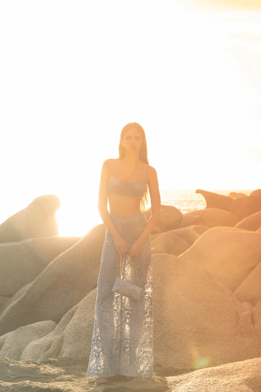 Figure dissolving into golden haze, Ermanno Scervino campaign photographed by Ina Cenusa