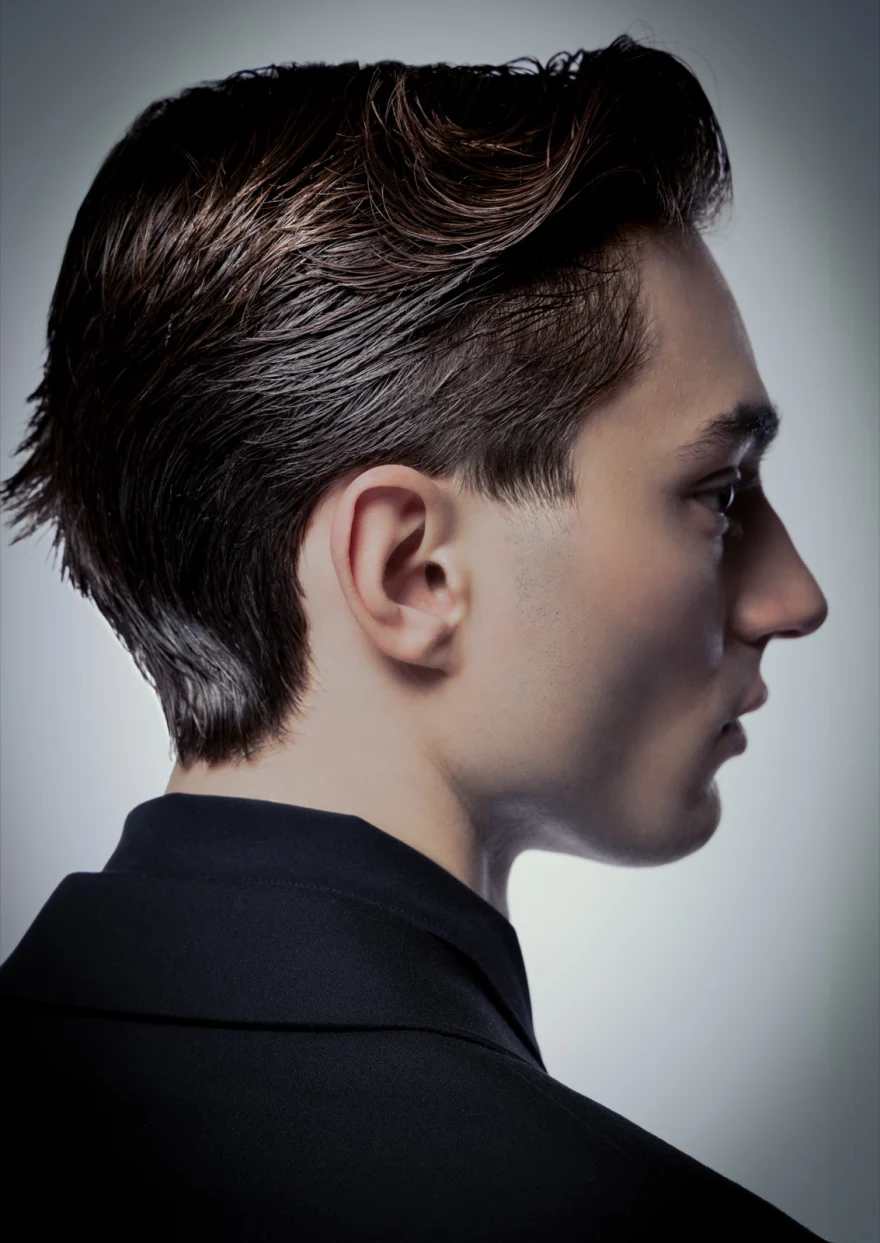 Close profile of a man's brushed-back hair, Philip Martin's campaign photographed by Ina Cenusa