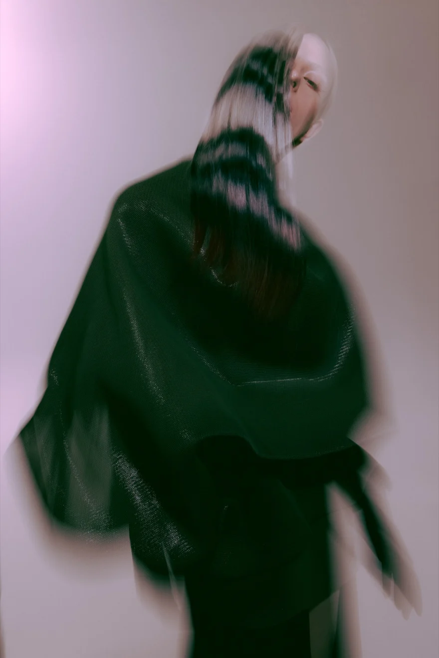 Motion-blurred figure in a flowing dark cape, editorial study in movement, SHOT Magazine editorial photographed by Ina Cenusa