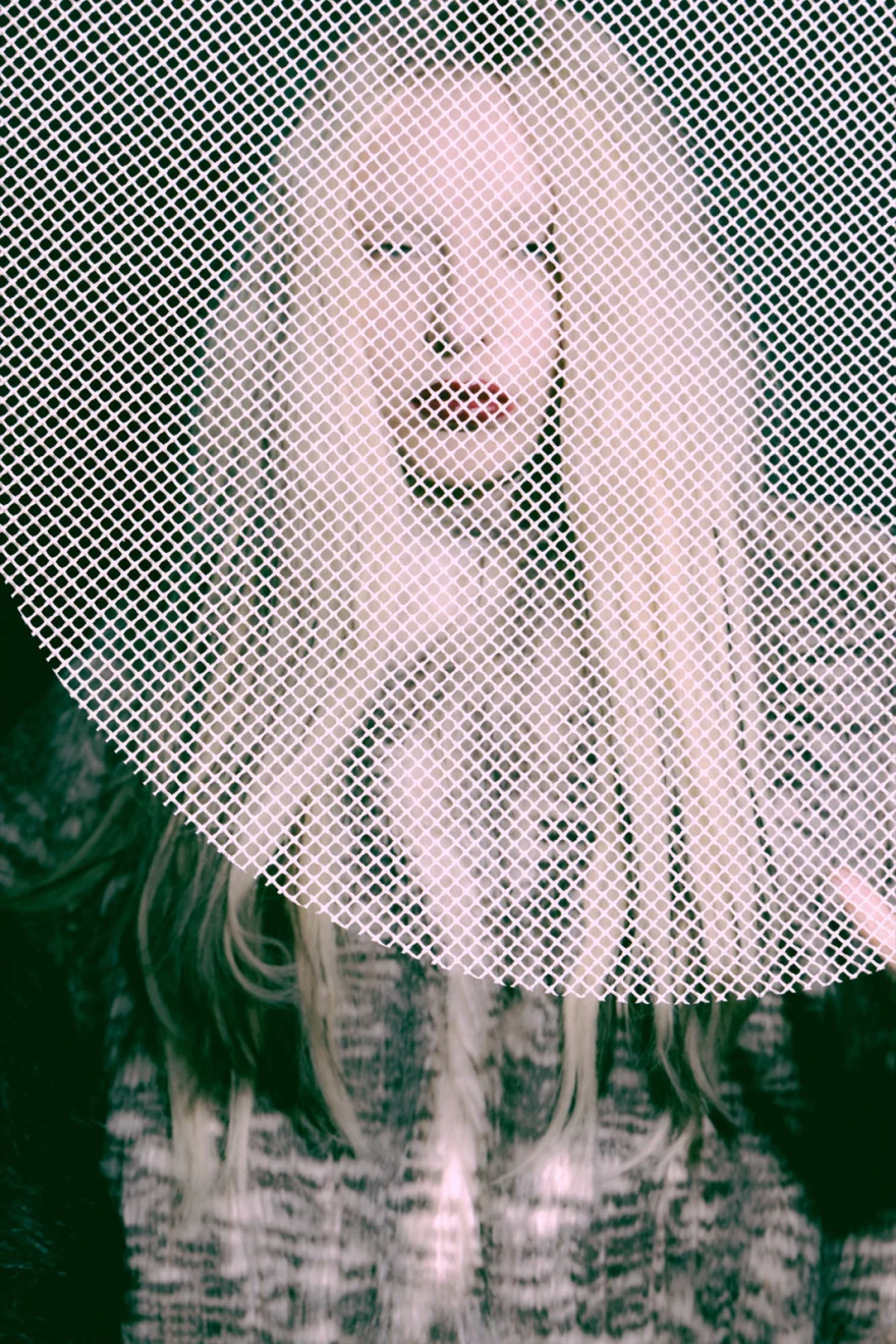 Portrait of a blonde model seen through a halftone mesh overlay, SHOT Magazine editorial photographed by Ina Cenusa