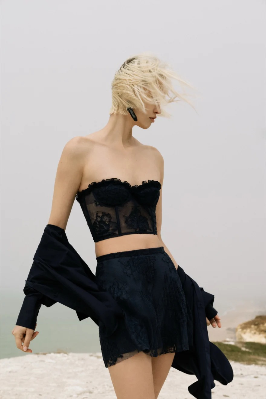 Model in a blue satin look on the shore, Ermanno Scervino campaign photographed by Ina Cenusa