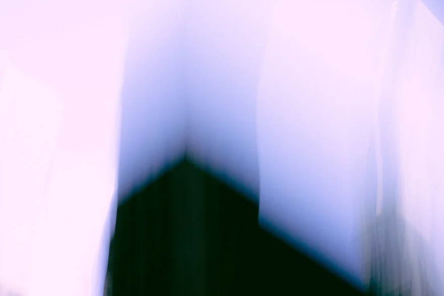 Solitary dark New York tower rising into an empty white sky, personal project photographed by Ina Cenusa
