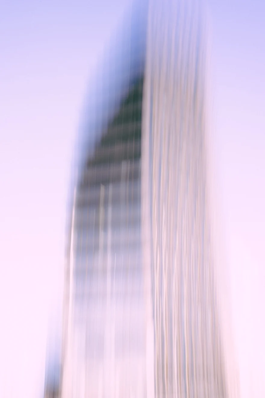 Curved glass tower in New York stretched into a single luminous sweep, personal project photographed by Ina Cenusa