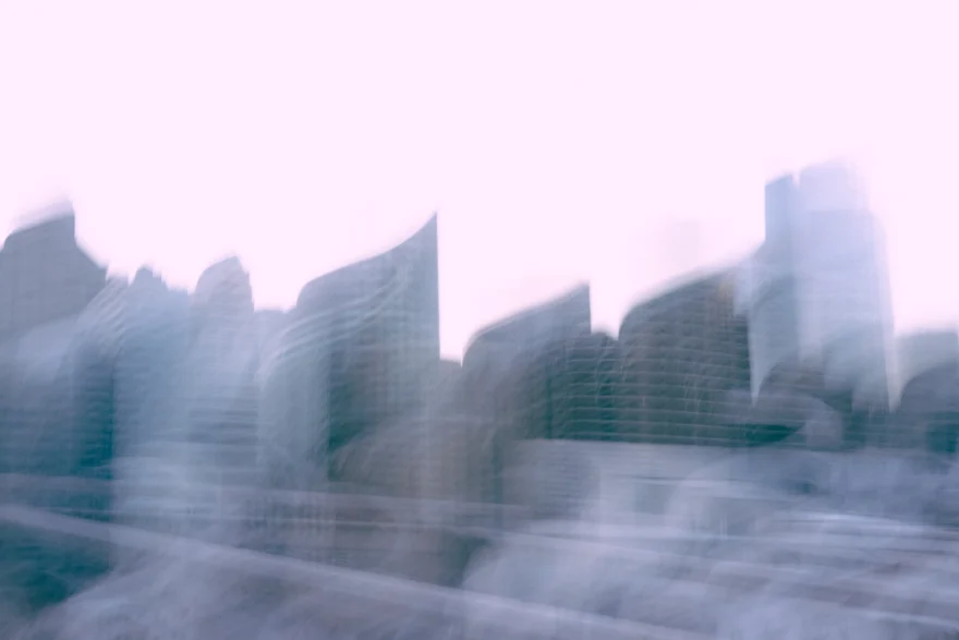 Pale New York waterfront skyline seen from the water, closing the series, personal project photographed by Ina Cenusa