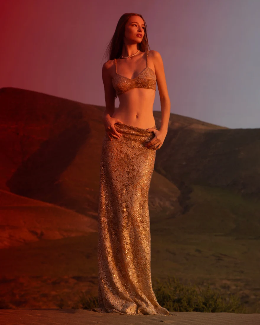 Backlit figure on the dune ridge, Ermanno Scervino campaign photographed by Ina Cenusa