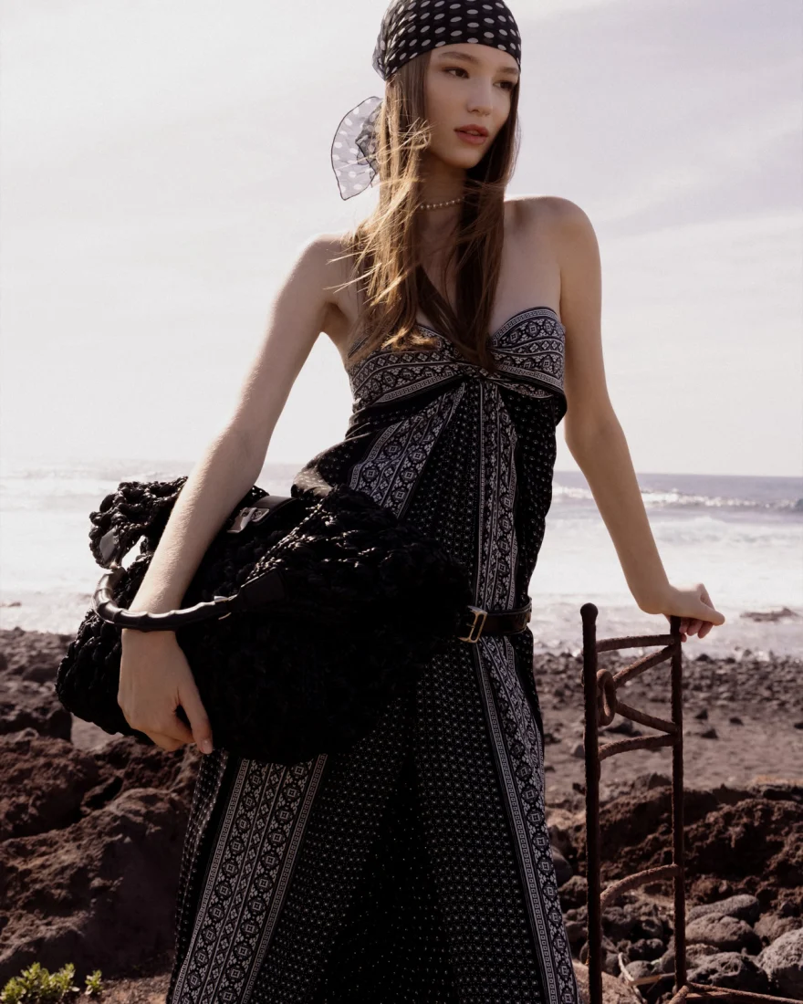 Model in denim beside palm trees, Ermanno Scervino campaign photographed by Ina Cenusa