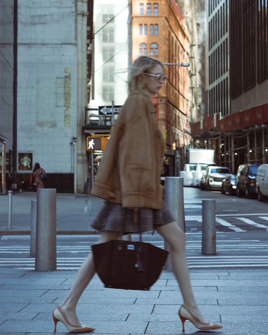 Model in a shearling coat on a New York subway platform, Ermanno Scervino campaign photographed by Ina Cenusa
