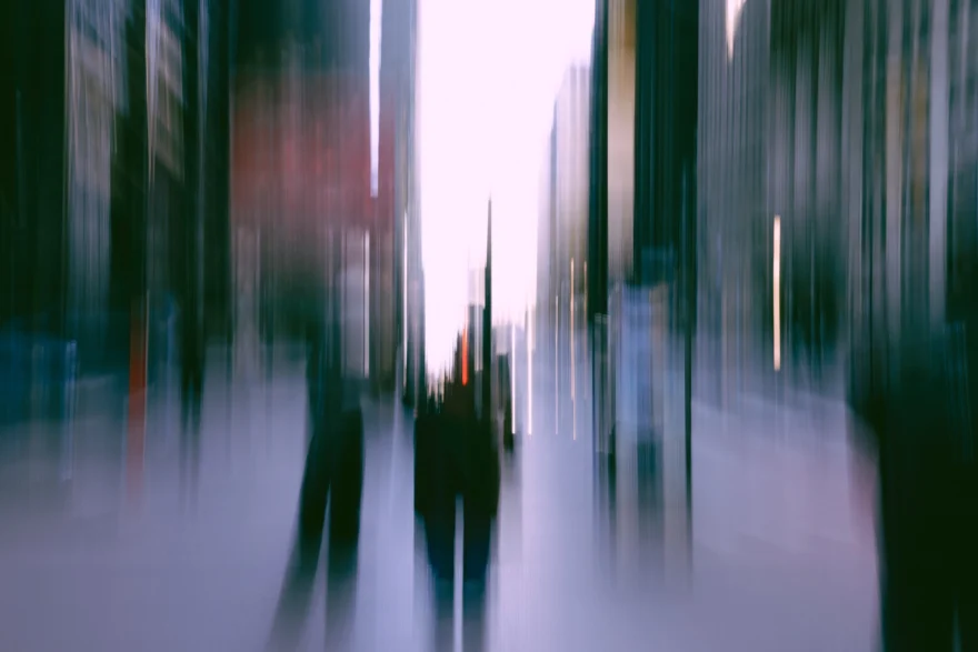 Figures crossing a Manhattan avenue, long exposure abstraction, New York photographed by Ina Cenusa