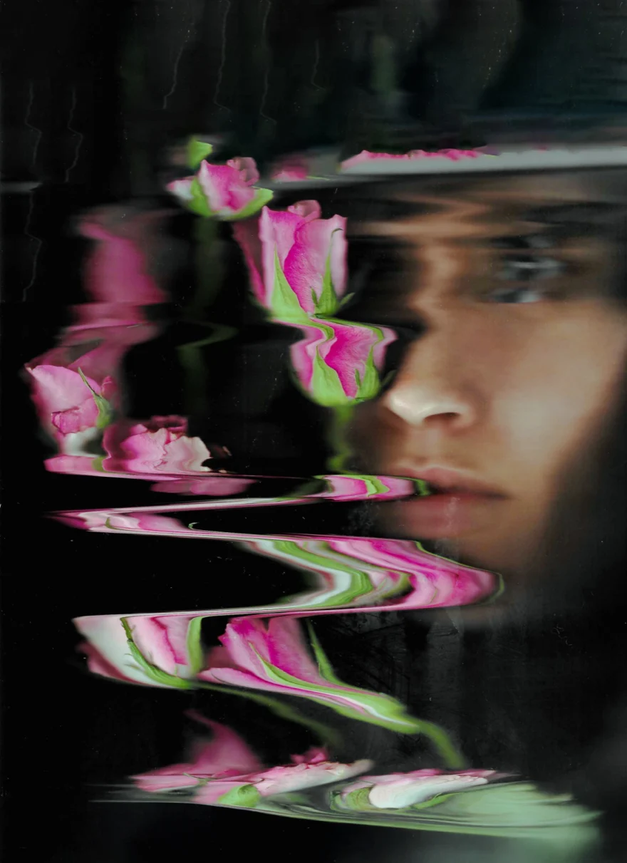 Portrait fractured by prism reflections and pink flowers, personal project photographed by Ina Cenusa